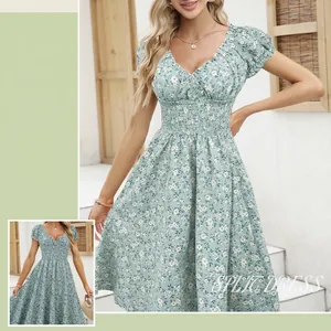 Vintage French floral midi dress with short puff sleeves and flattering V-neckline