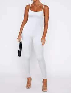 Detailed view of the white ribbed texture on a tight-fitting long bodysuit jumpsuit.