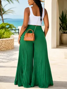Back view of high-waist green pleated wide-leg pants for a stylish summer resort look