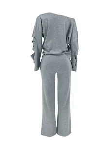 Back view of gray two-piece lounge set with ripped sleeve details and wide-leg pants