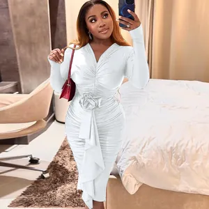 Elegant long-sleeve V-neck bodycon dress featuring a decorative waist rose and ruched detail