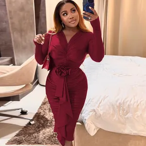 Elegant burgundy V-neck ruched bodycon dress featuring a large 3D fabric rose waist detail