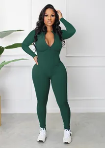 Stylish dark green ribbed long sleeve jumpsuit with functional front zipper closure