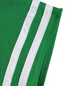 High-quality close-up detail of green sportswear fabric with double white stripes and stitching