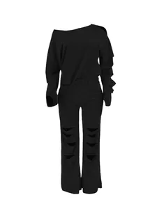 Full view of black distressed two-piece set featuring off-shoulder top and ripped pants