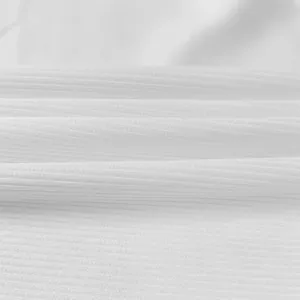 Macro detail view of soft white ribbed fabric texture for summer slim tank dress