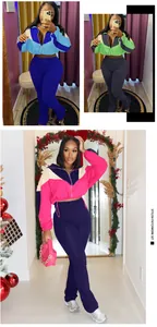 Detail of stylish color-block cropped zip-up jacket and flare leggings set