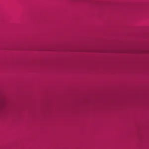 Macro-opname van levendige magenta gebreide stoftextuur voor een damesmode set van hoge kwaliteit