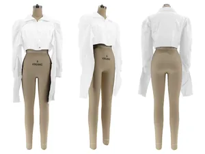 Detailed front side and back views of white puff shoulder cropped high low shirt