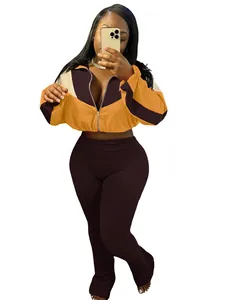 Women's two-piece color-block sports set featuring cropped zipper jacket and slim fit pants