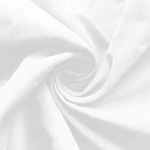 Macro detail view of soft white shirt fabric texture with elegant spiral fold design
