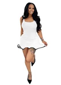 Close-up detail of white sleeveless ribbed dress with a stylish black wavy hemline.