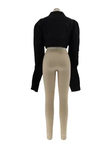 Professional back view of a black cropped shirt with puff sleeves on a mannequin torso
