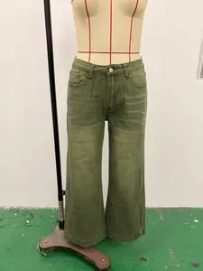 Retro olive green washed wide-leg denim jeans on mannequin showing high-waist fit