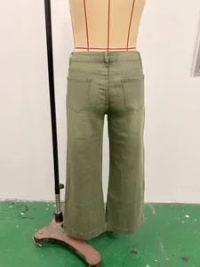 Detailed back view of olive green vintage washed wide-leg denim pants on a studio mannequin
