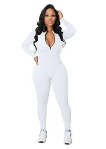 White ribbed long-sleeved jumpsuit featuring a functional front zipper detail.