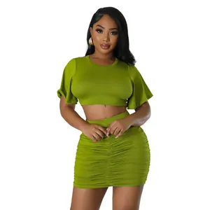 Fashionable olive green two-piece outfit featuring a ruffled crop top and ruched bodycon mini skirt