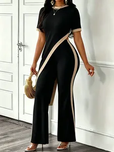 Detail view of two-piece ribbed set with asymmetric crop top and wide-leg pants