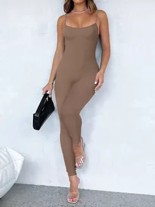 Detailed close-up of a brown ribbed bodycon jumpsuit with thin spaghetti straps