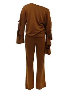 Detailed back view of a brown two-piece loungewear set with shredded torn sleeves