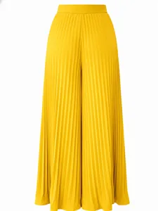 Macro view of bright yellow pleated wide-leg pants showing fine texture and drape