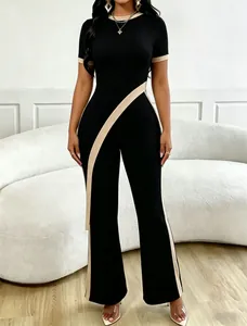 Detail showing a chic black and beige diagonal contrast design on a two-piece set