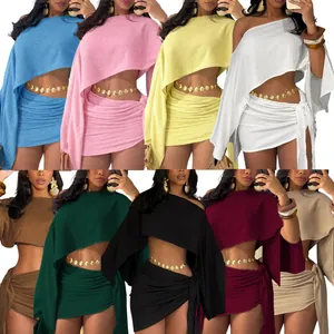 Elegant one-shoulder crop top and lace-up mini skirt two-piece resort set in various colors