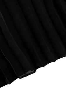Close-up detail shot of black pleated fabric texture and hem stitching for wide-leg pants