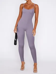 A sexy purple ribbed backless camisole jumpsuit for women shown in a clean studio shot