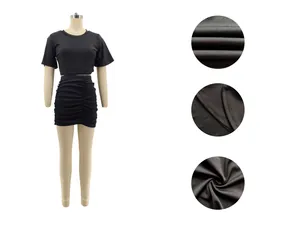 Close-up view showing fabric texture and stitching of black two-piece sexy fashion set