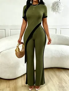 Detailed view of women's two-piece set with diagonal contrast trim and wide-leg pants
