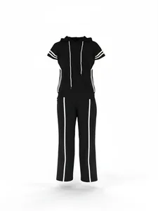 Close-up of women's sporty two-piece set with hooded t-shirt and striped pants