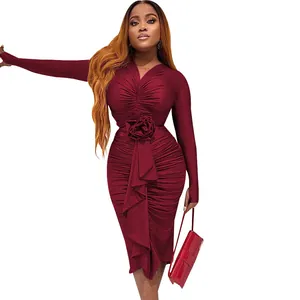 Elegant burgundy ruched bodycon midi dress with V-neck and decorative rose detail