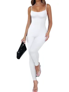 Detail of white ribbed backless jumpsuit with sexy spaghetti straps and slim fit design