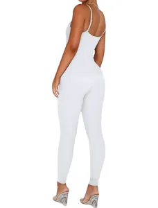 Back view showing the ribbed texture and open back design of the white spaghetti strap jumpsuit