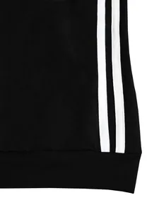 Detailed macro view of the three white vertical stripes on black athletic sportswear