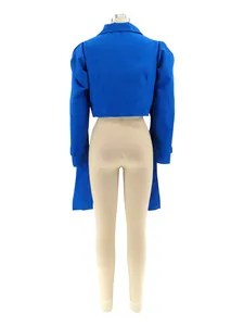 Detailed back view of a vibrant blue puff shoulder crop shirt on a sewing mannequin