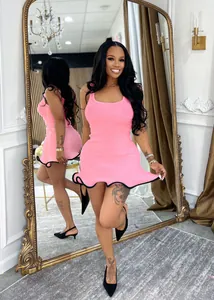 Pink sleeveless bodycon dress with black wavy hem detail and ribbed knit texture