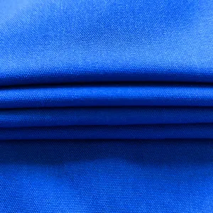 Macro close-up view of the vibrant blue fabric texture and woven material details