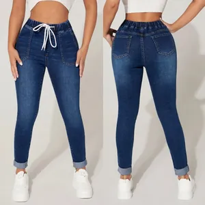 Vue avant et arrière de ce jean skinny bleu foncé à taille haute et cordon de serrage.
