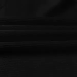 Detailed macro view showing the fine ribbed texture of a black sleeveless tank dress fabric