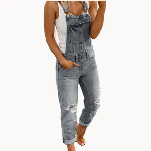 Stylish women's blue washed distressed denim overalls with slim fit jumpsuit design