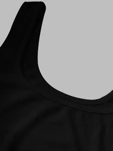Macro detail of black ribbed fabric and U-neckline stitching on a slim tank dress