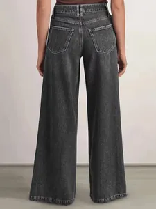 Jean femme taille haute à jambes larges en denim noir délavé, vue arrière de style minimaliste