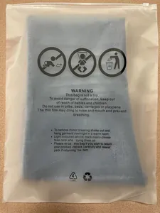 Detailed view of light blue women's slim-fit stretch jeans inside a frosted zipper bag with warning