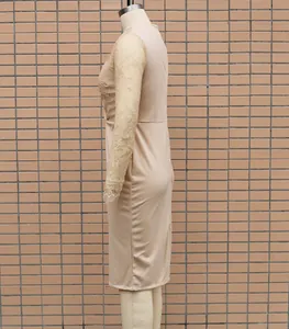 Side view of champagne lace patchwork bodycon dress on a mannequin