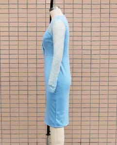Detail view of a light blue slim-fit dress with elegant lace long sleeves on mannequin