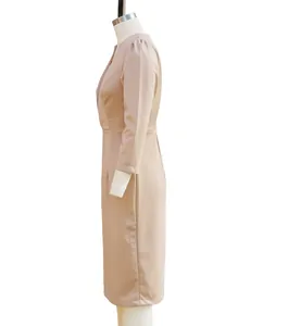 Detailed side view of an elegant slim-fit solid color midi dress with a stand collar