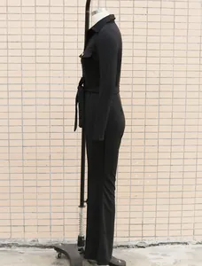 Side profile of elegant black long-sleeved shirt collar jumpsuit on display stand.