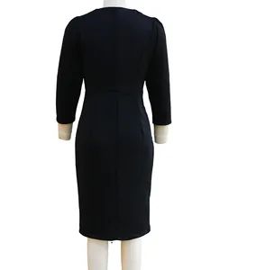 Detailed back view of a slim-fit black long-sleeved midi dress for elegant women